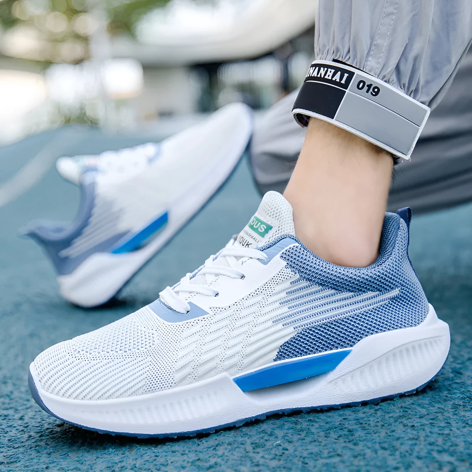 Men's blue, grey, and green breathable mesh casual shoes with cloth upper and moulded sole.
