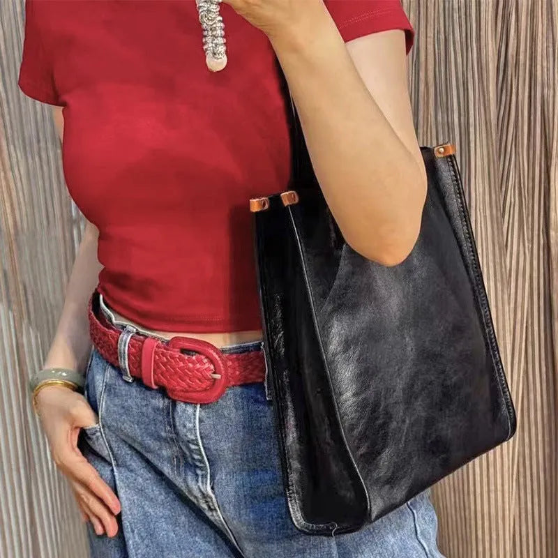 Large capacity genuine leather city commuter shoulder tote bag in black, soft square vertical shape with slit pocket