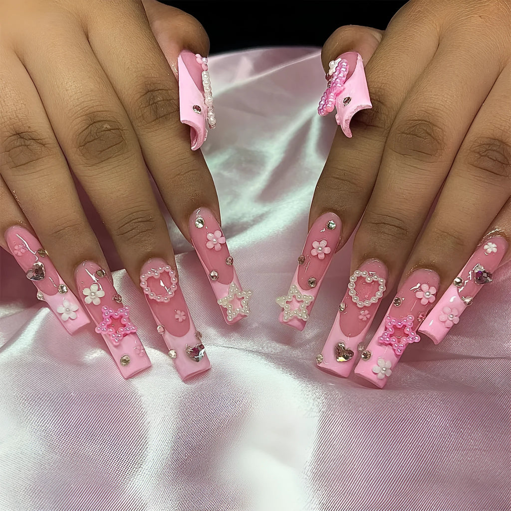 Super long water pipe shaped artificial nails with French spot drill and a bow detail in colour XB-70-48.