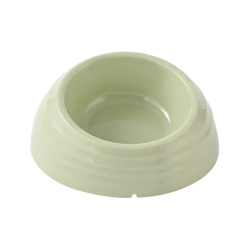 Stainless steel cat bowl on a plastic base in a choice of beige, brown, or light green.