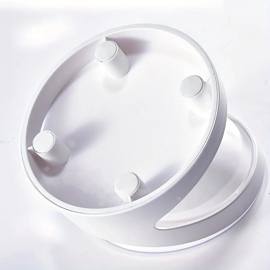 White elevated cat food bowl with clear plastic construction and anti-vomit tilt design