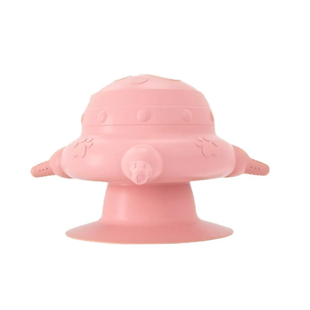 Pink silicone pet nursing bottle with bionic breast shape and four attached nipples on a flat base.