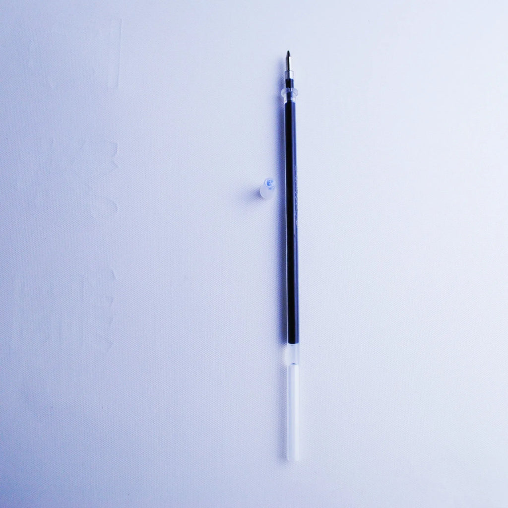 Automatic fading pen with 0.5mm tip, plastic housing, blue ink refills, and pen holder
