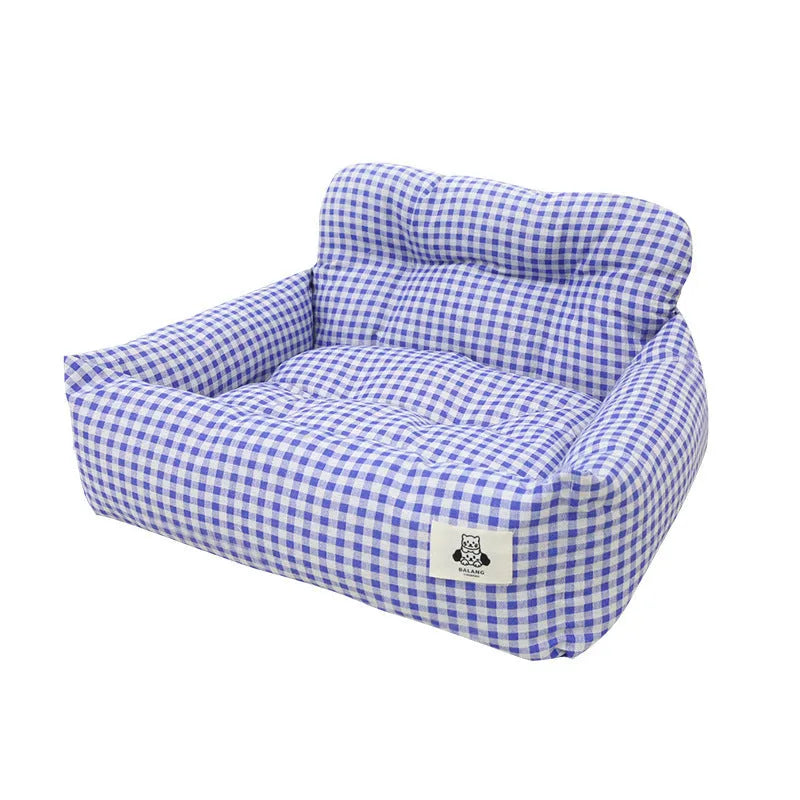 Grey and blue plaid cloth dog carrier baskets designed for mounting in a car, shown in small and large sizes.