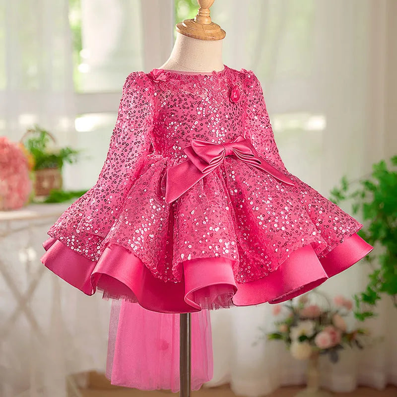 Girl's rose red sequined tulle tutu dress on child, polyester fabric, full skirt, side view