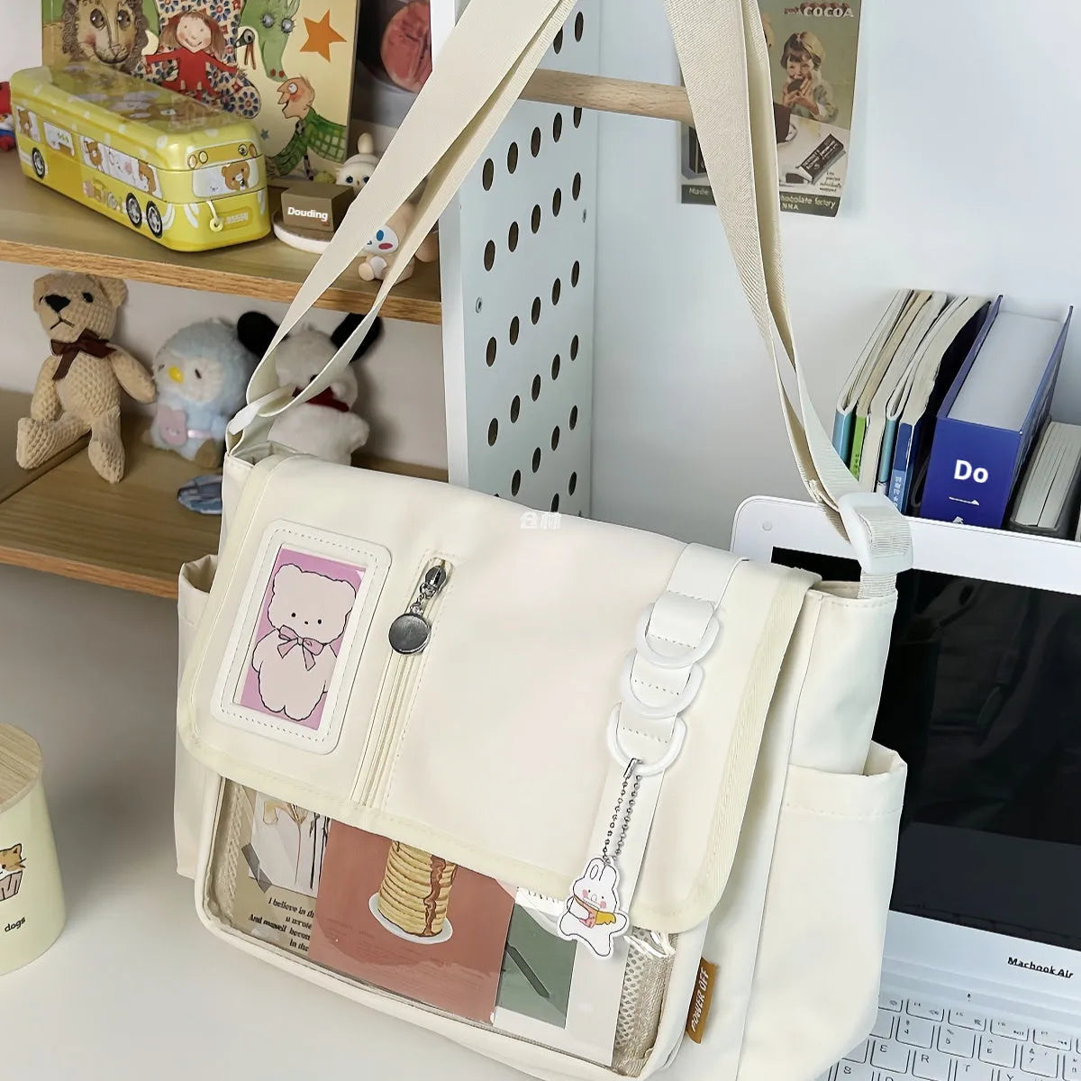 Canvas crossbody bag, waterproof, lightweight, 33x27x15cm, with fur ball pendant, black option