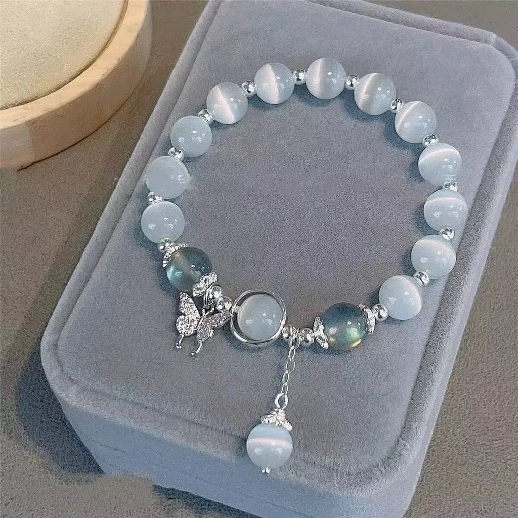 Glass butterfly bracelet for women with drop-shaped coloured glaze beads in grey moonlight colour option