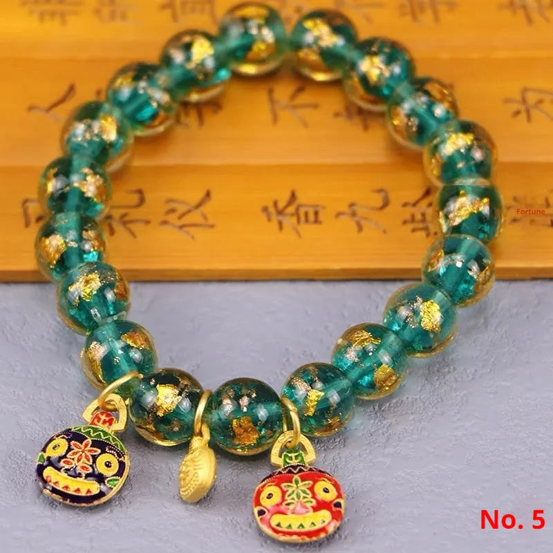 Ancient French Glaze Year Bracelet with geometric glass beads and auspicious patterns in multiple colours.