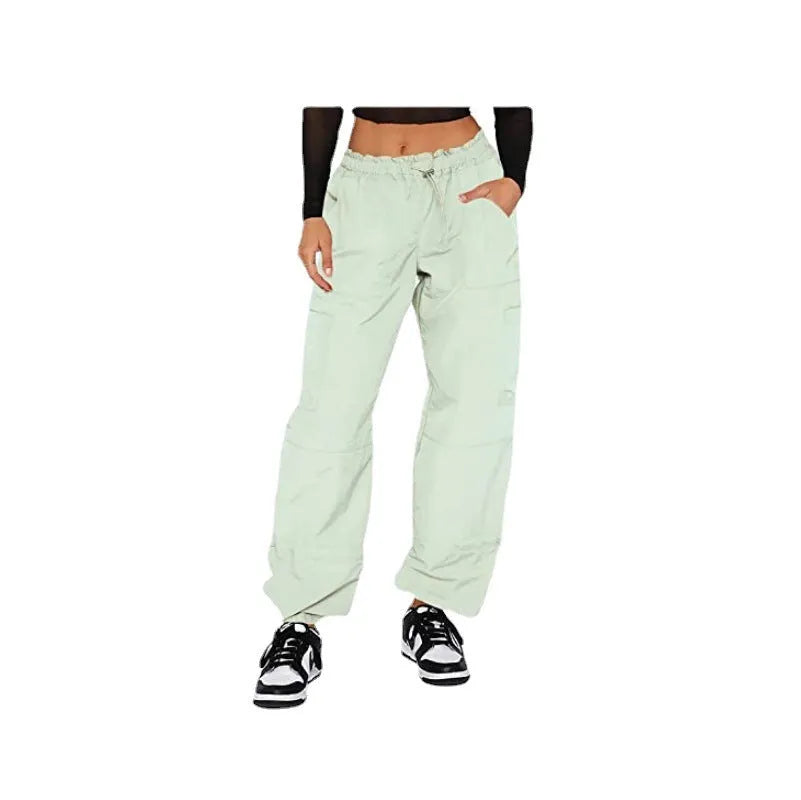 Multi-pocket straight-leg cargo casual pants in a light blue colour on a neutral background.
