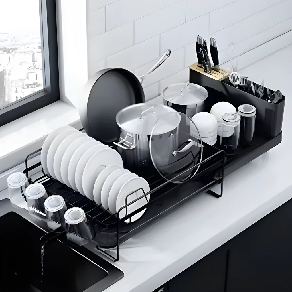 Retractable carbon steel kitchen dish drain rack holding cutlery and cups on sink