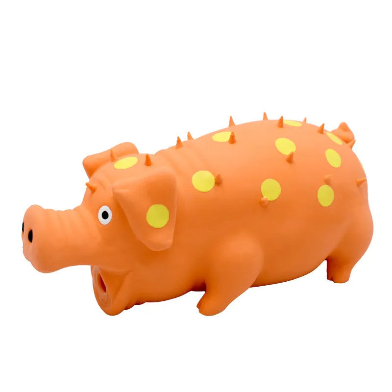Pig-shaped latex dog chew toy with textured surface and squeaker in various colours