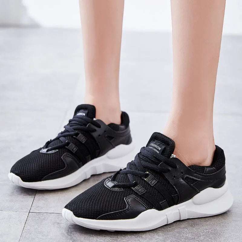Men's breathable mesh sneakers with hollow-out design and flat EVA sole in black and white colour options