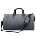 Men's light grey Oxford cloth travel bag showing oval shape, single strap, and internal organisation compartments.