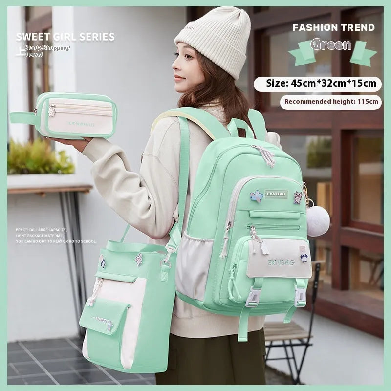 Girls' pink waterproof Oxford cloth school backpack with curved shoulder straps.