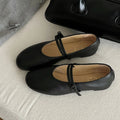 Soft retro round toe Mary Jane flat shoes in black sheepskin leather with buckle closure and low heel