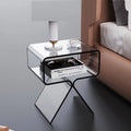 Minimalist acrylic side table in transparent black, 39x30x45cm, beside a sofa in a living room