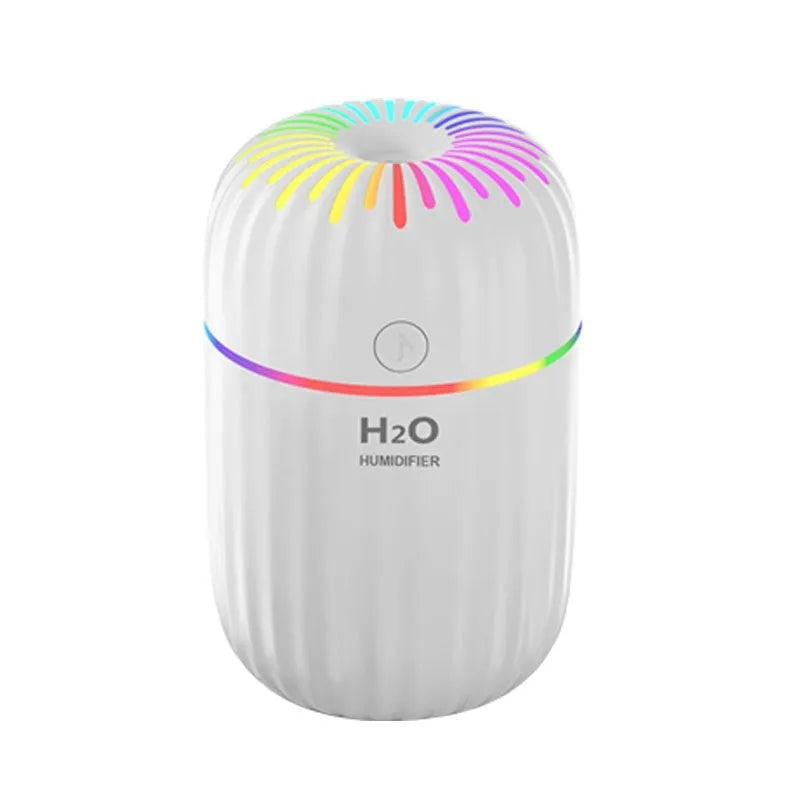 USB mini humidifier with fireworks design in green colour, showing compact 75x75x116mm dimensions