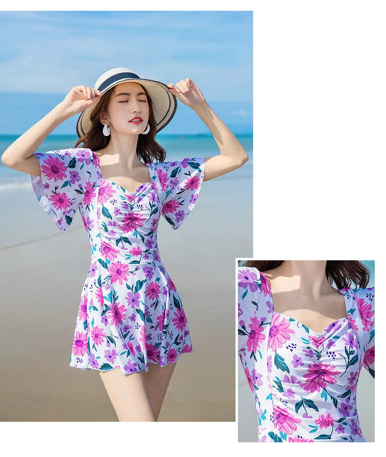 Women's slim-fit one-piece swimsuit with floral print in blue, red, or yellow pattern options.