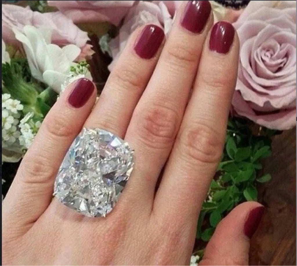 Women's geometric square diamond ring with white gold colour finish on a hand