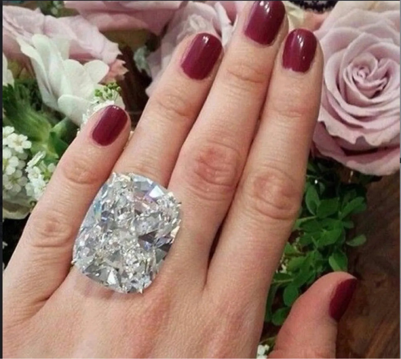 Women's geometric square diamond ring with white gold colour finish on a hand
