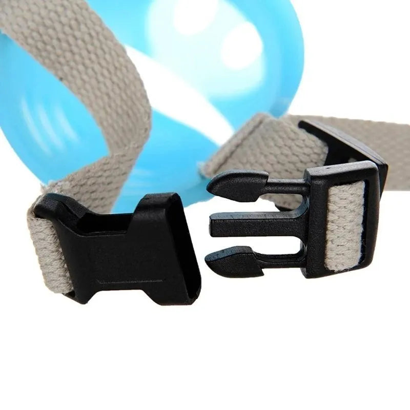 Blue silicone anti-bite mouth cover for dogs showing sizing on long-nosed pet