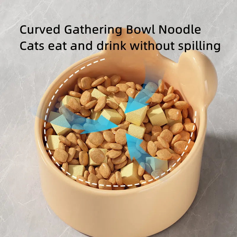 White and yellow ceramic pet bowls with raised neck guards in two sizes.