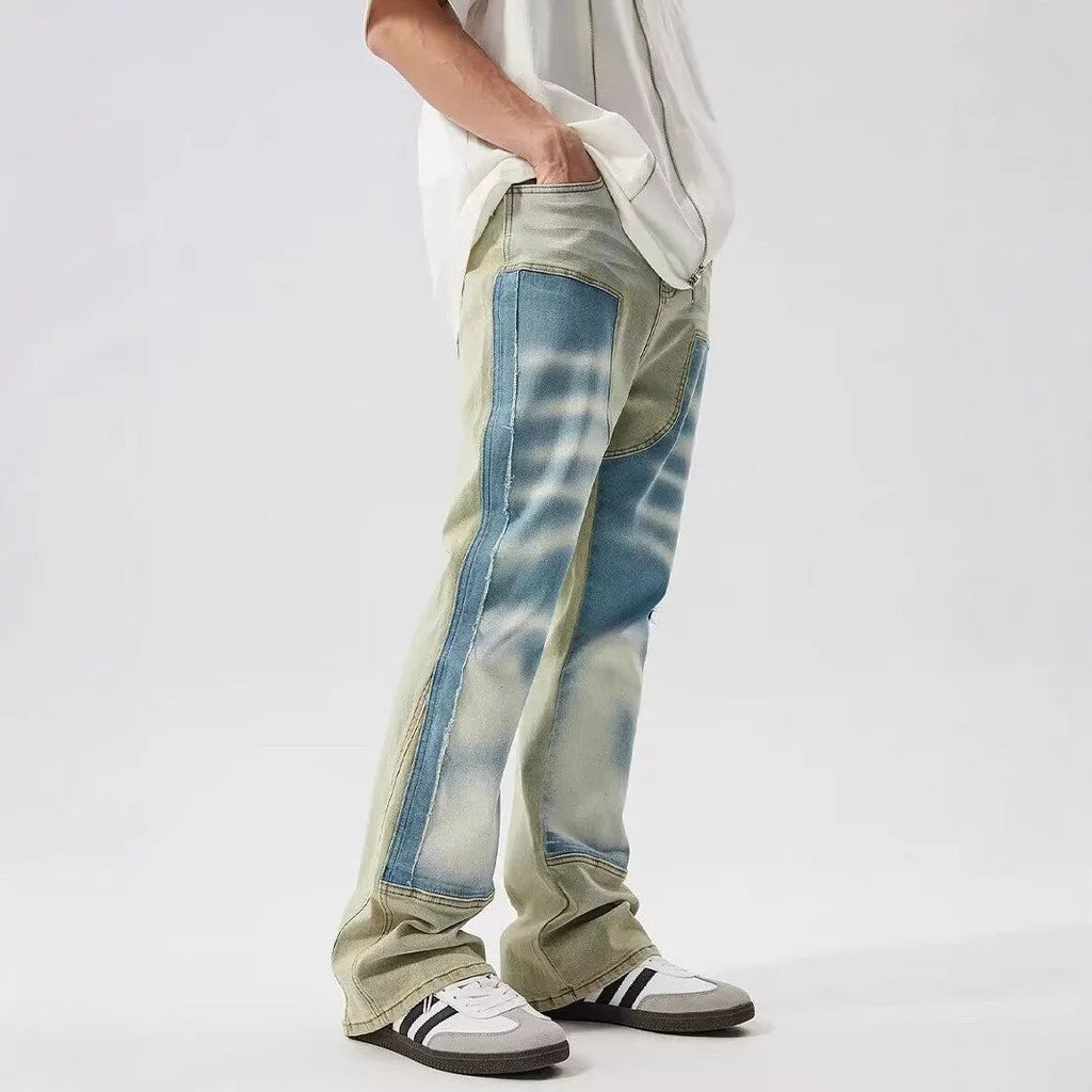 Retro dual-colour patchwork jeans with splash ink damaged design on denim trousers