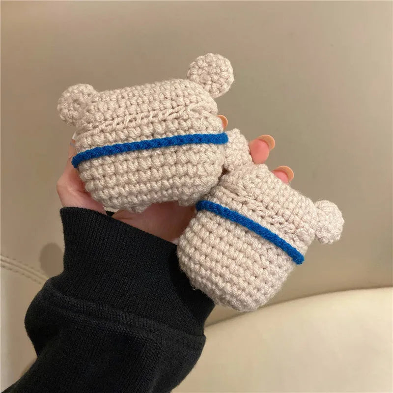 Hand knitted AirPods protective sleeve with koala bear backpack design on Apple AirPods case