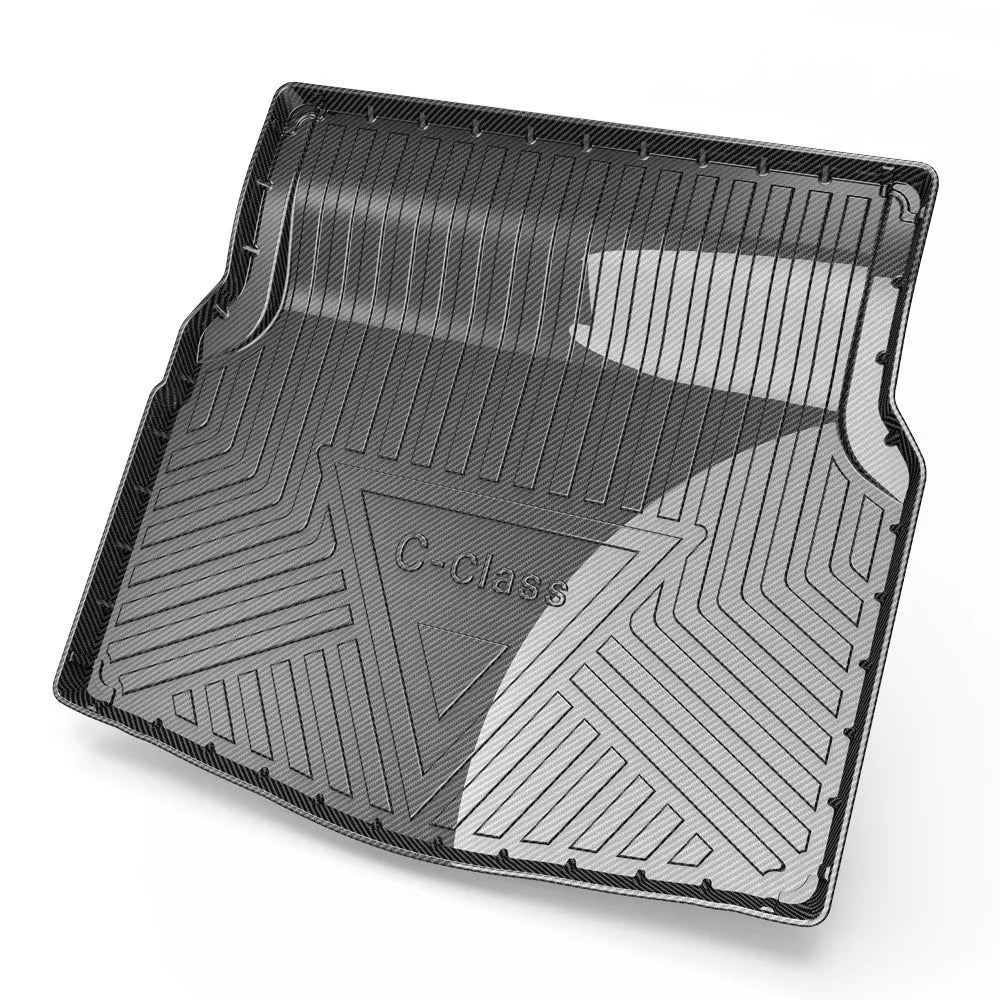 Black carbon fibre pattern TPE car boot liner mat for vehicle trunk protection.