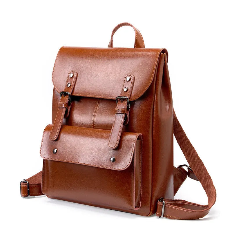 Genuine two-layer cowhide leather computer backpack for women in black, brown, or coffee.