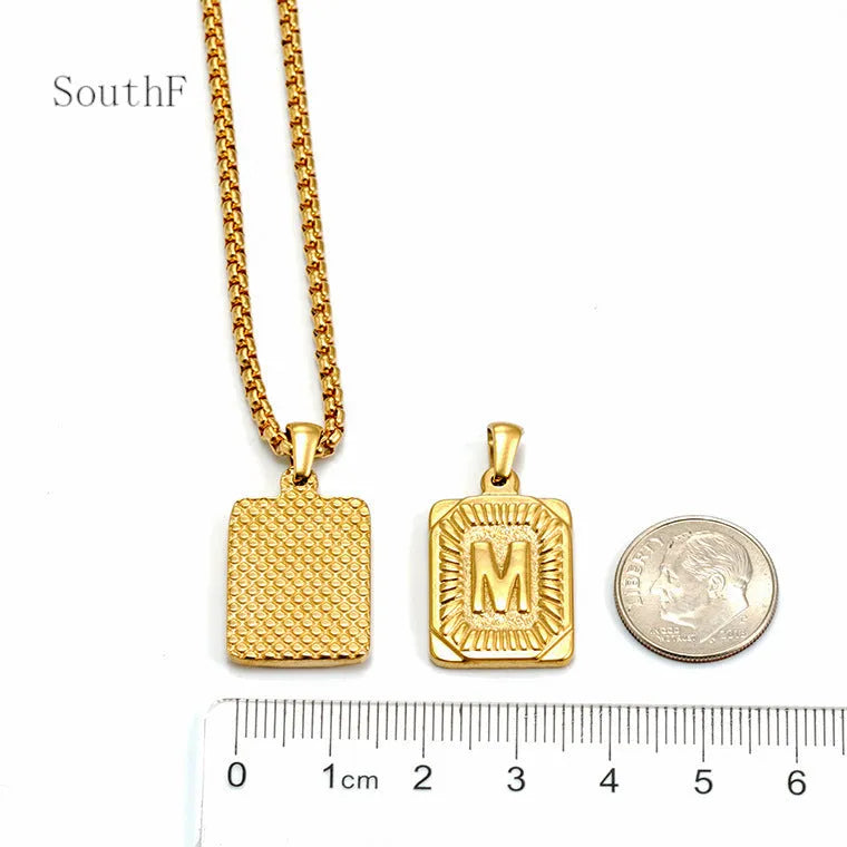 Gold-plated 18K titanium steel letter pendant necklace with pearl chain, unisex, letter M shown.