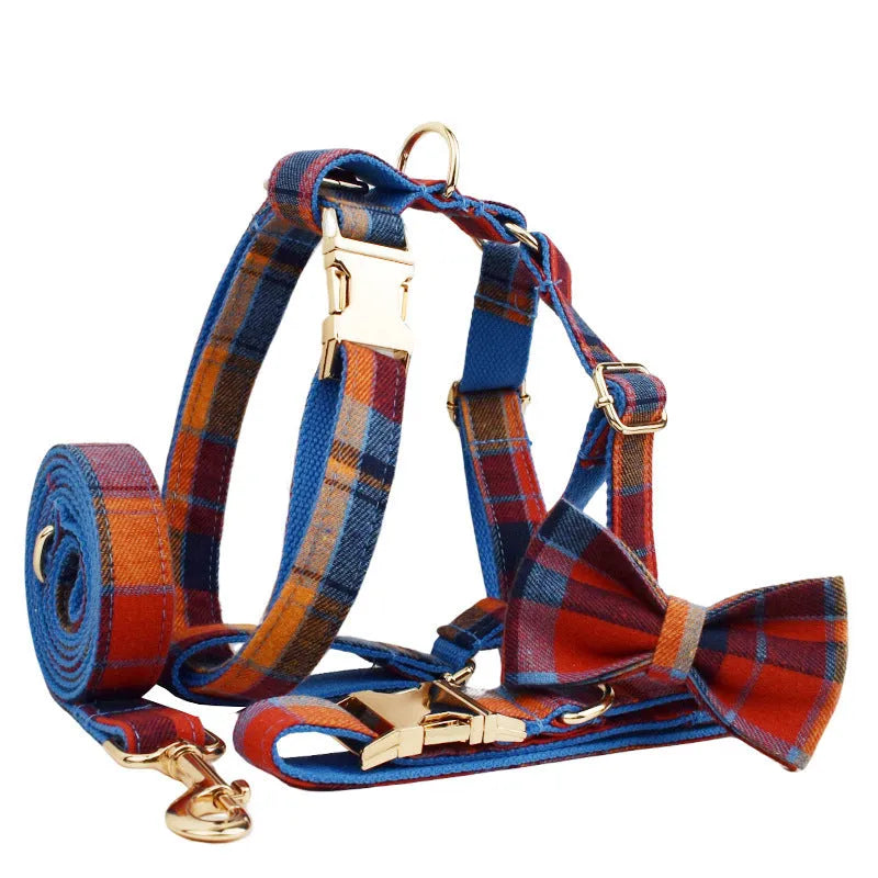 Four-piece dog fashion set showing collar, leash, bow tie and vest in coordinated cloth material