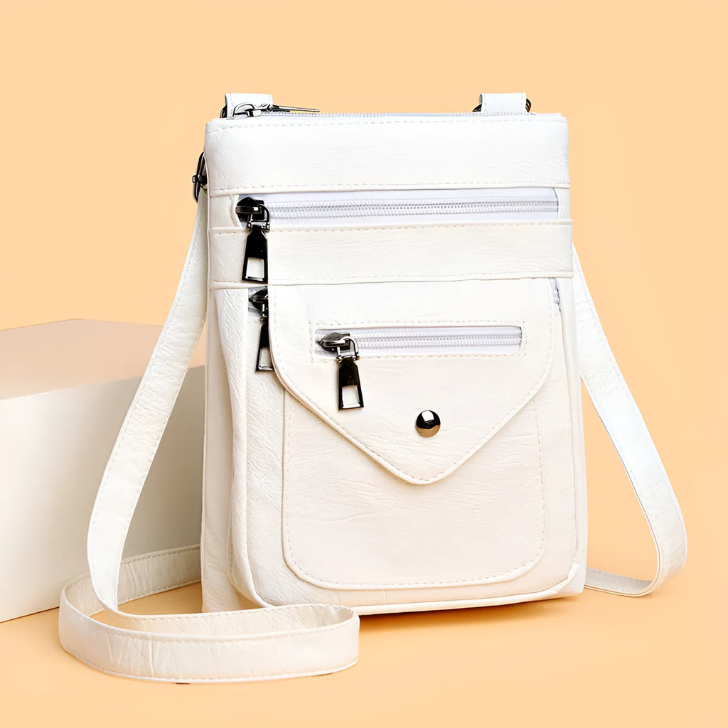 Vertical square crossbody phone shoulder bag in PU with sewing line detail, shown in available colours.