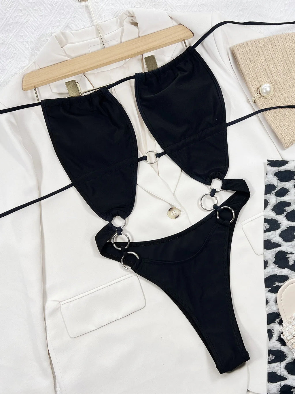 Black sleeveless one-piece swimsuit for women made from nylon fabric