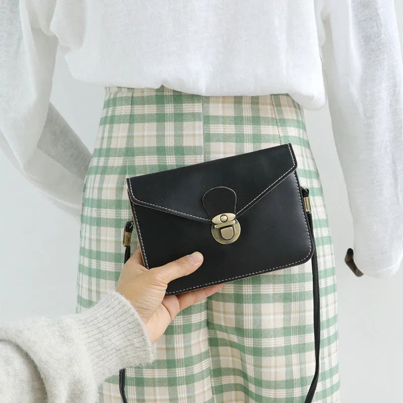 Retro shoulder messenger bag in wine red with flap closure and crossbody strap