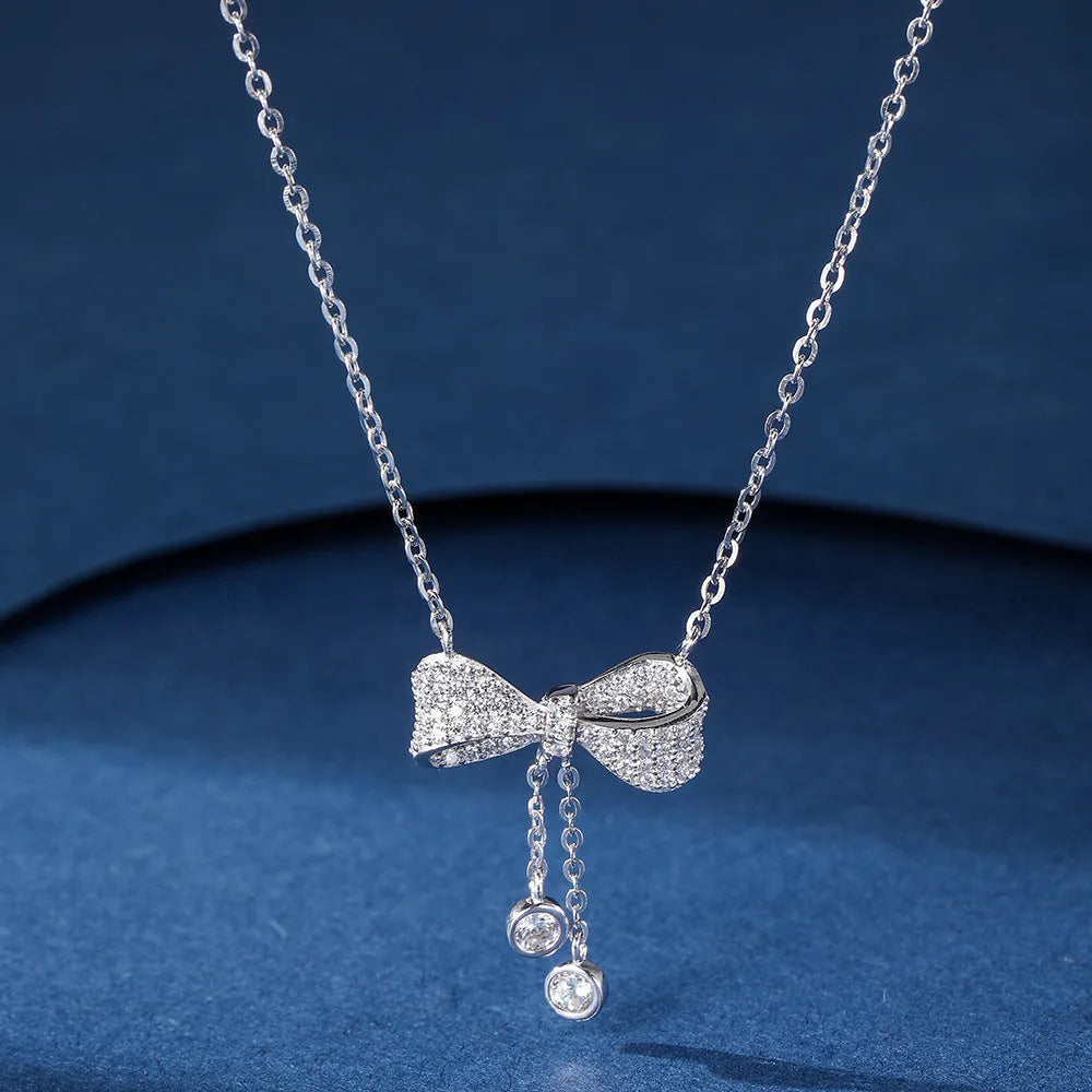 S925 sterling silver bow pendant necklace on O-ring chain with 40-45cm circumference