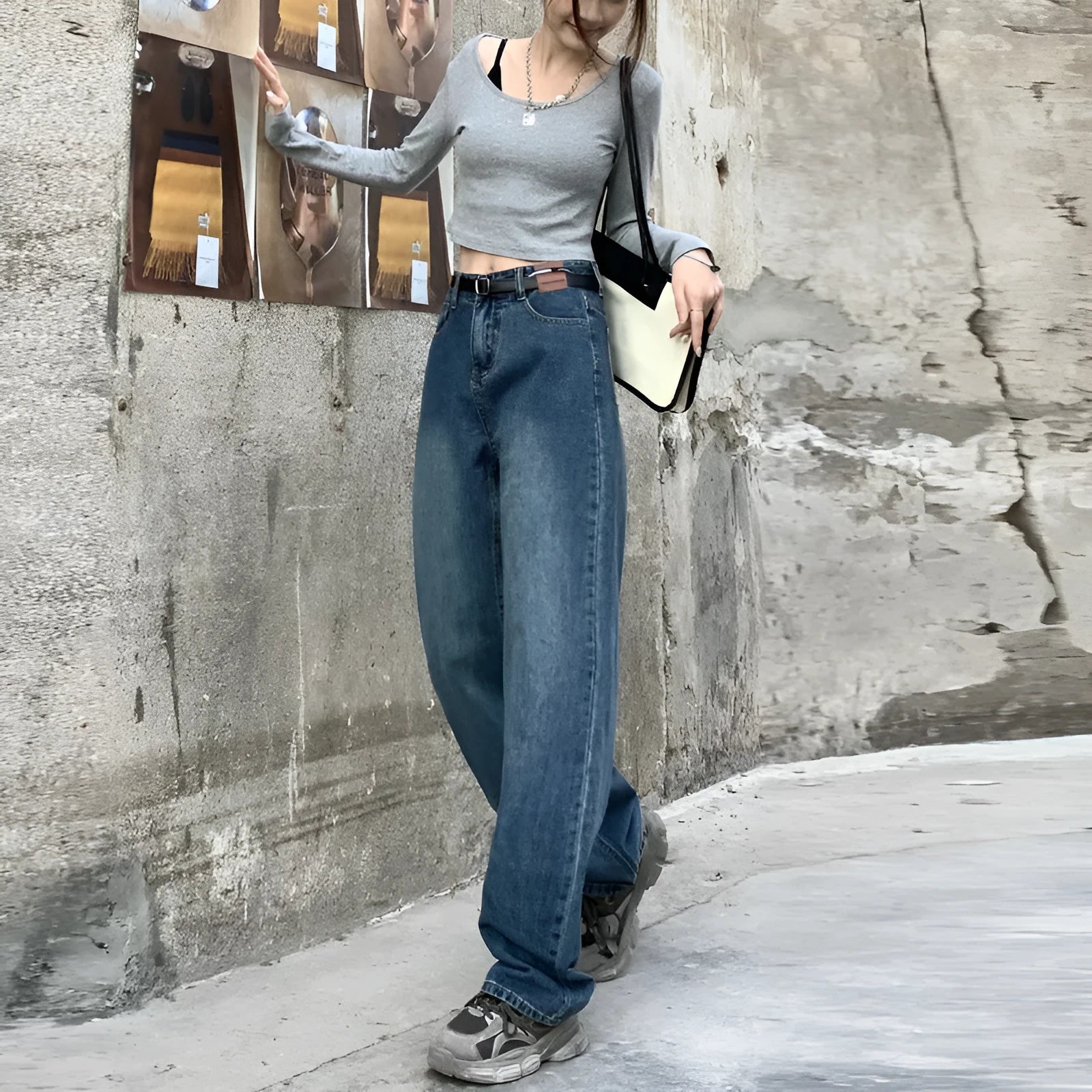 A pair of women's high waist straight leg jeans in retro blue cotton denim.