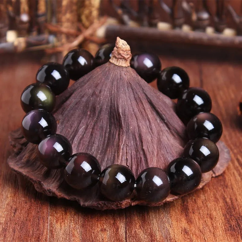 Polished geometric crystal bracelet with ice stone beads in various sizes on wrist