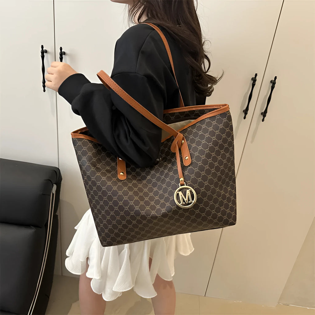 Women's structured PU leather shoulder bag in street-trend style with sewing thread detail.