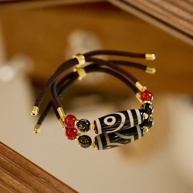 Handmade agate Dzi bead bracelet with 8mm beads in a Tibetan ethnic style.