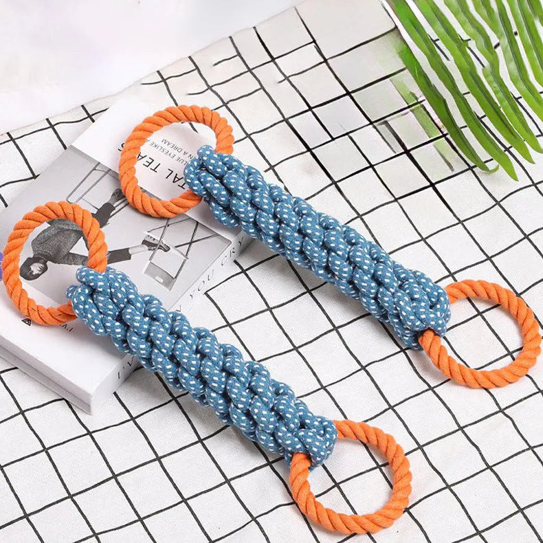 Blue double-ring braided cotton rope dog chew toy showing knot details and size against white background