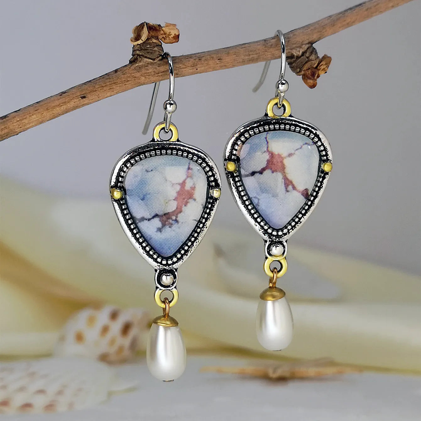 Retro blue Bohemian drop earrings with synthetic opal and pearl stones on geometric metal setting