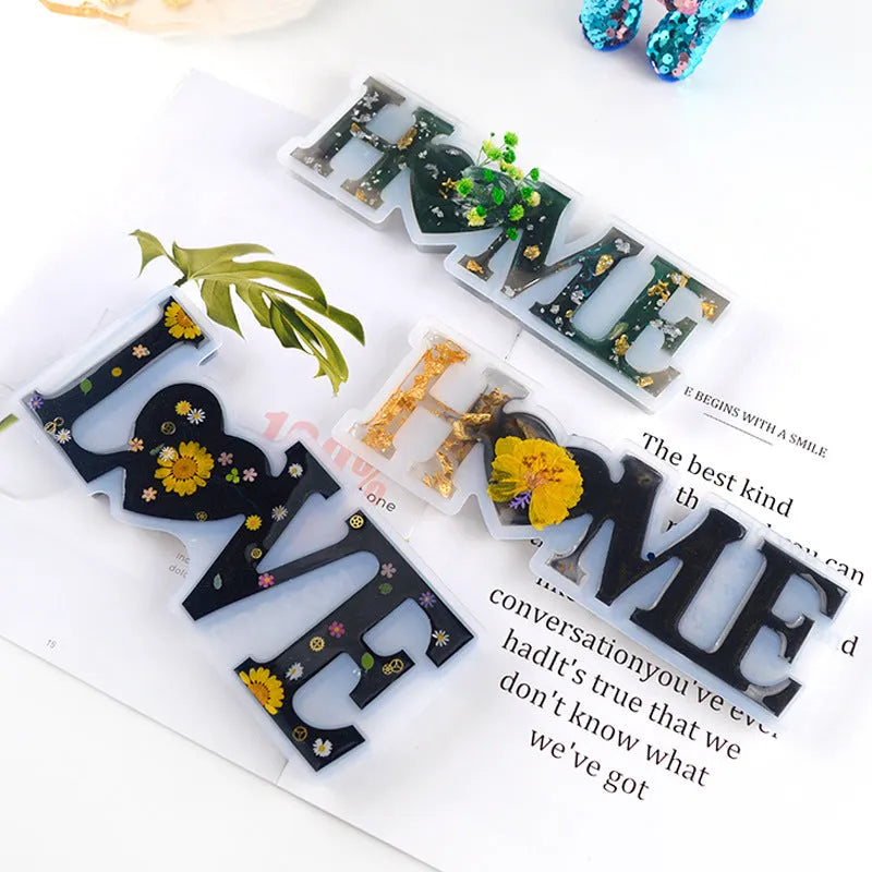 Flexible silicone epoxy mould showing raised letters for words love, home, family, live, hello, blessed.