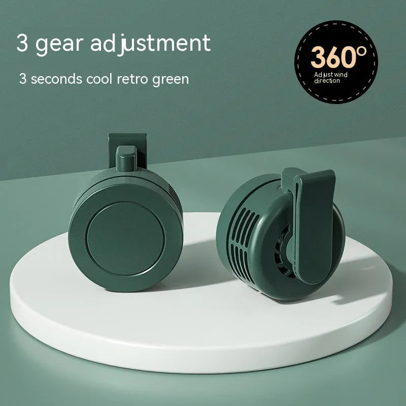 Green wrist hanging fan with light and USB power bank showing three speed settings and wearable design