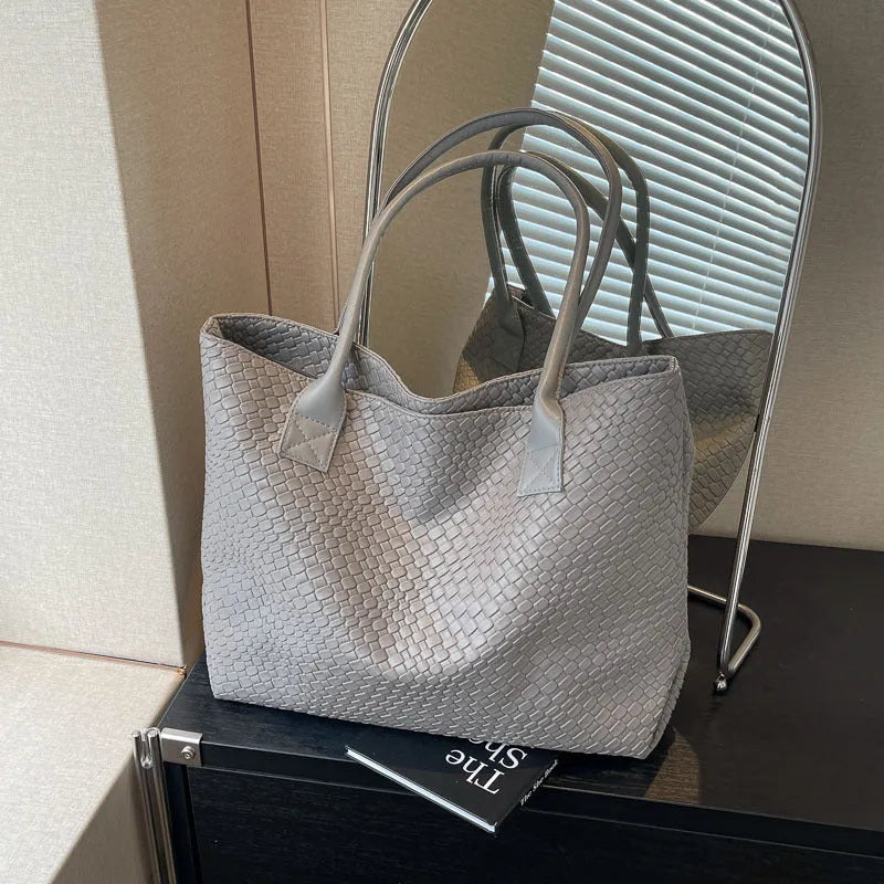 Woven PU shoulder bag for women with double straps, available in beige, black, gray, and khaki