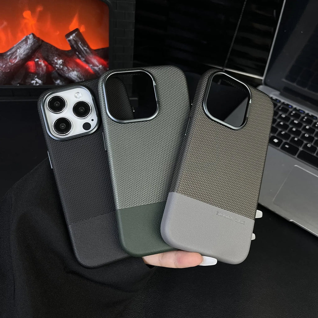 Black magnetic iPhone case with dragon scale texture and stitching, shown on an iPhone.