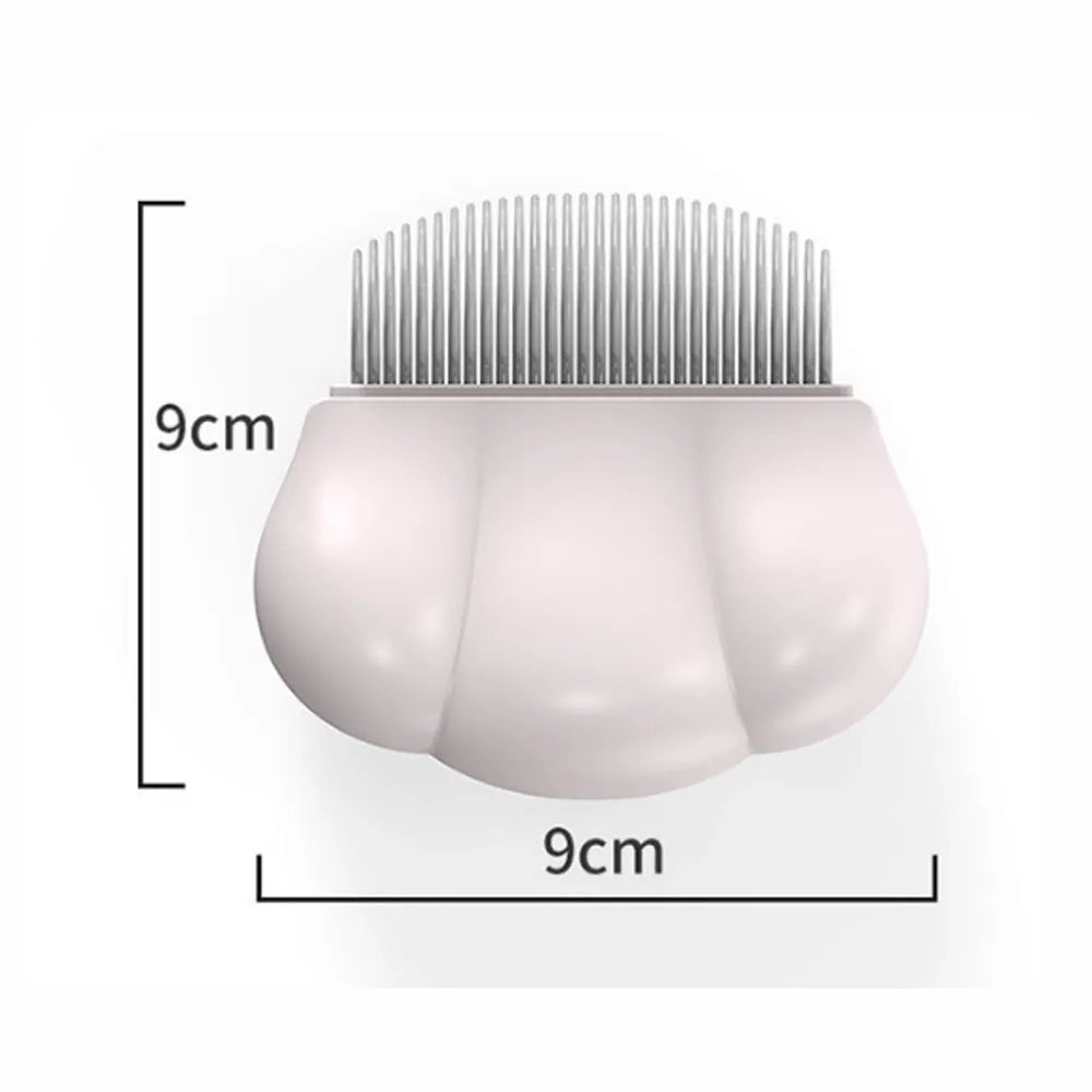 Blue Paw Soft deshedding brush for cats and dogs on a white surface.