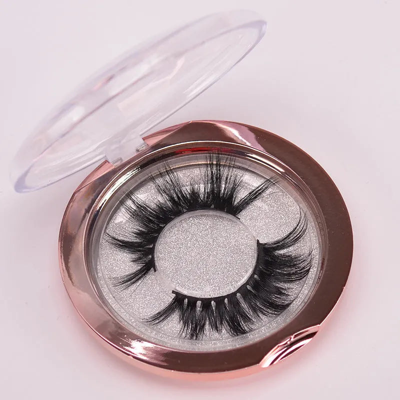 5D mink false eyelashes in natural black with double-headed brush and hair cap.