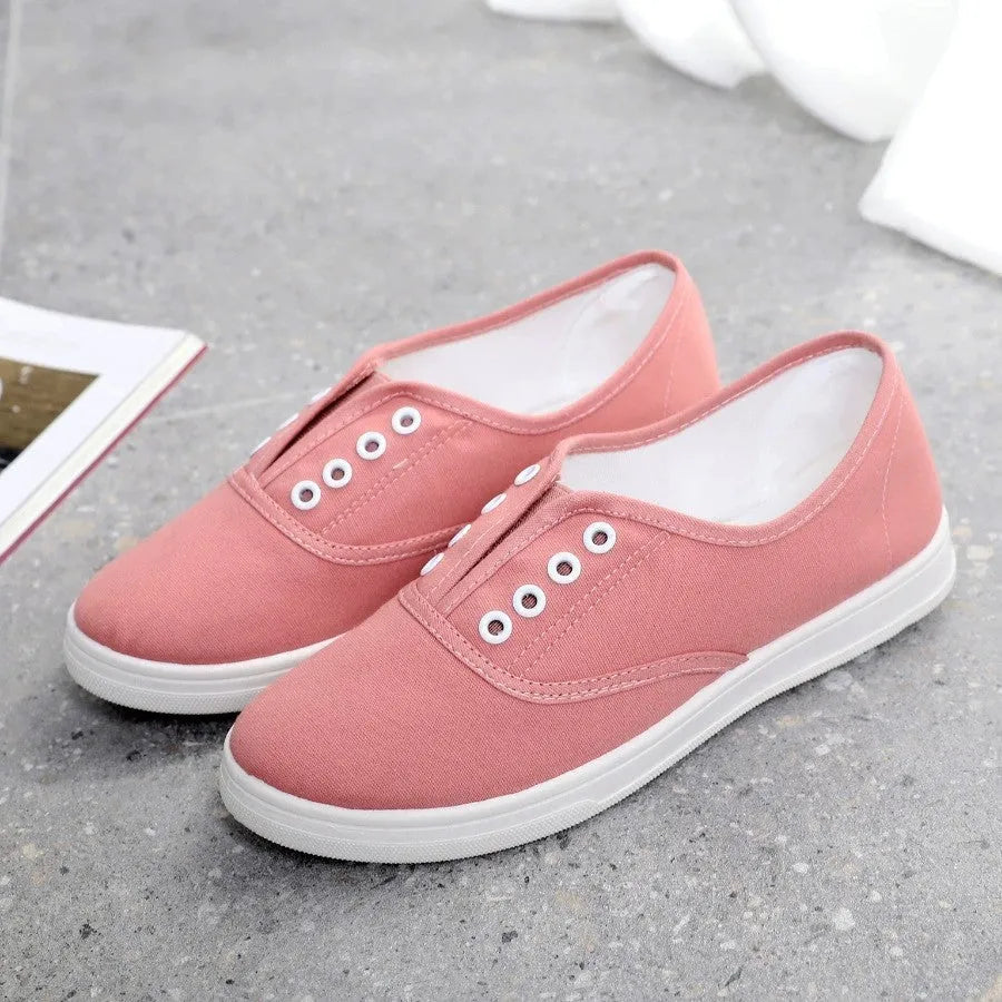 Low-top canvas casual shoes with flat heel and breathable cloth lining in multiple colour options