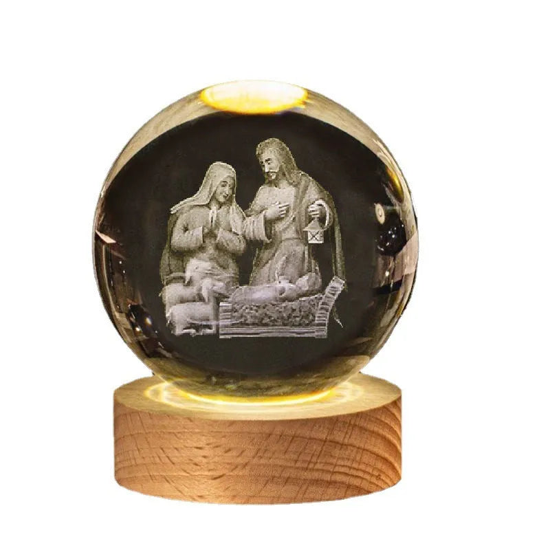 White crystal ball desk ornament with wood base and religious design inside